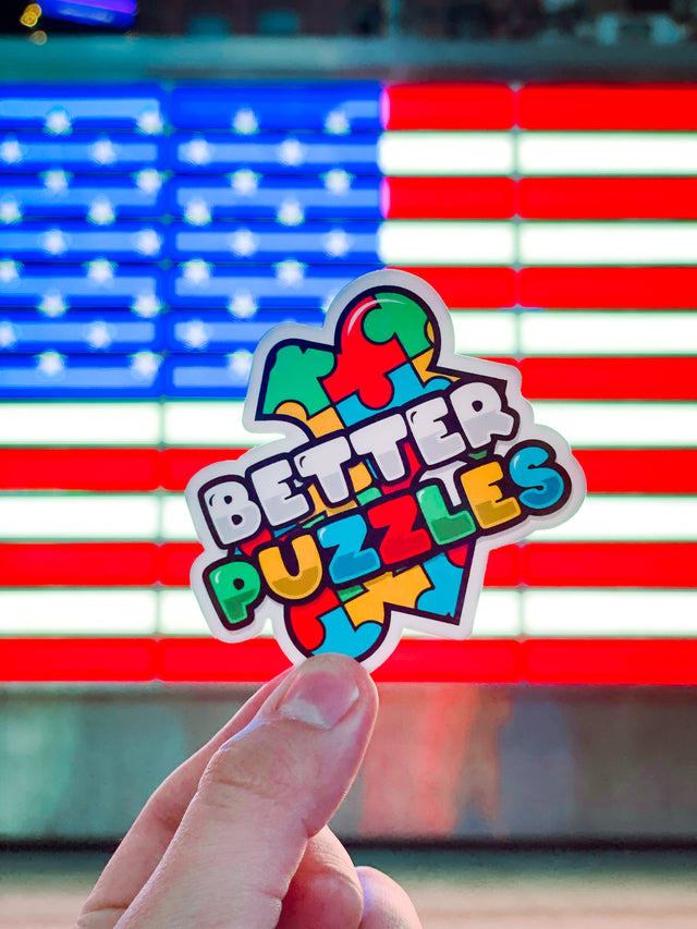 Better Puzzles logo art sticker live shot. Taken in New York City.
